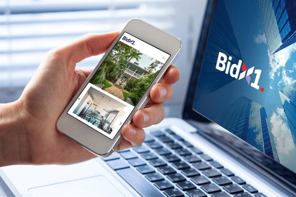 Real estate app concept on smartphone screen, person searching online